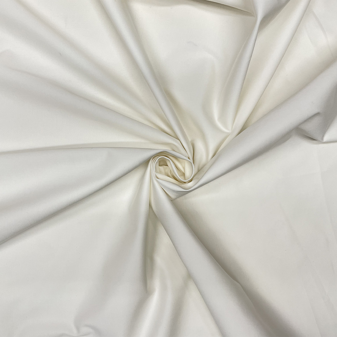 Tessuto Rasatello di cotone in tinta unita bianco seta - Iaia Tessuti