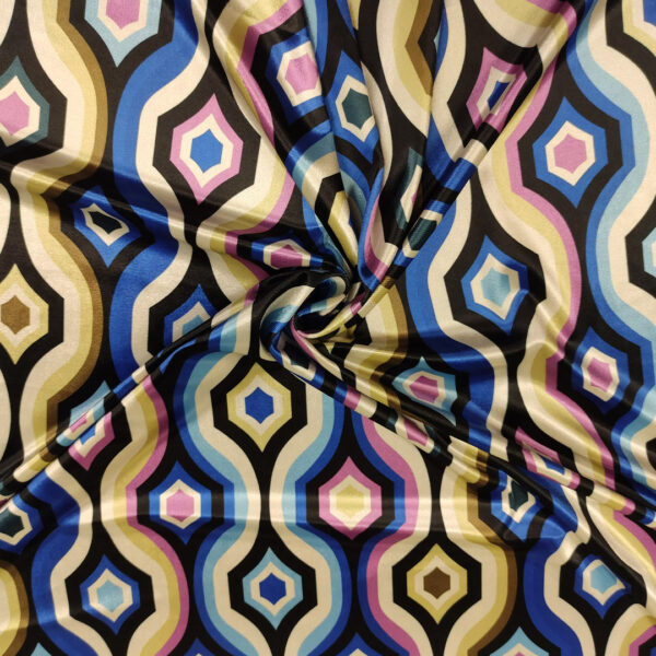 Tessuto Velluto elasticizzato a fantasia motivo geometrico panna - blu elettrico - glicine - nero