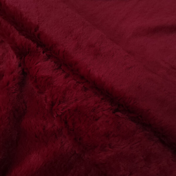 Tessuto Ecopelliccia tinta unita rosso scuro