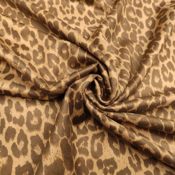 Tessuto simil dainetto a fantasia motivo animalier beige - marrone