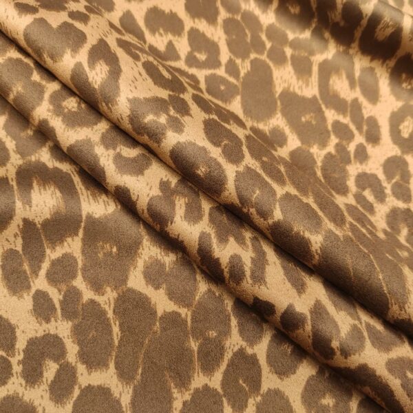 Tessuto simil dainetto a fantasia motivo animalier beige - marrone