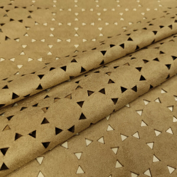 Tessuto simil dainetto traforato tinta unita beige