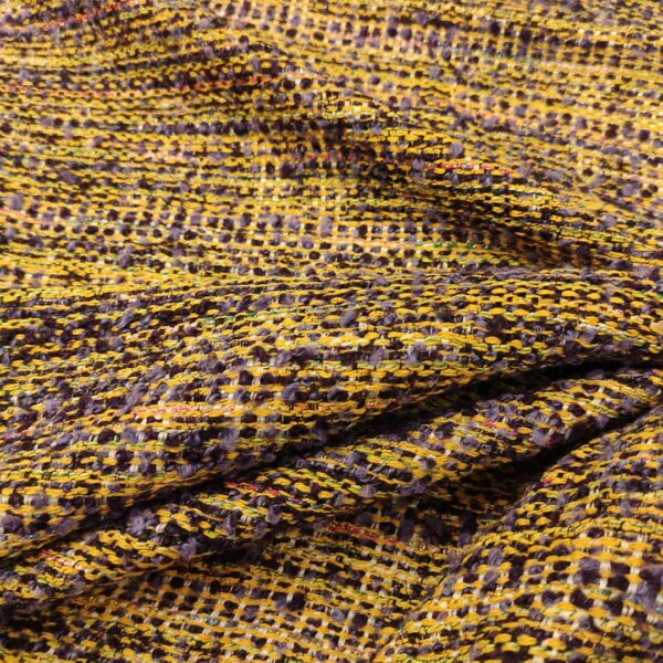 Tessuto Tweed Bouclé in lana giallo - viola