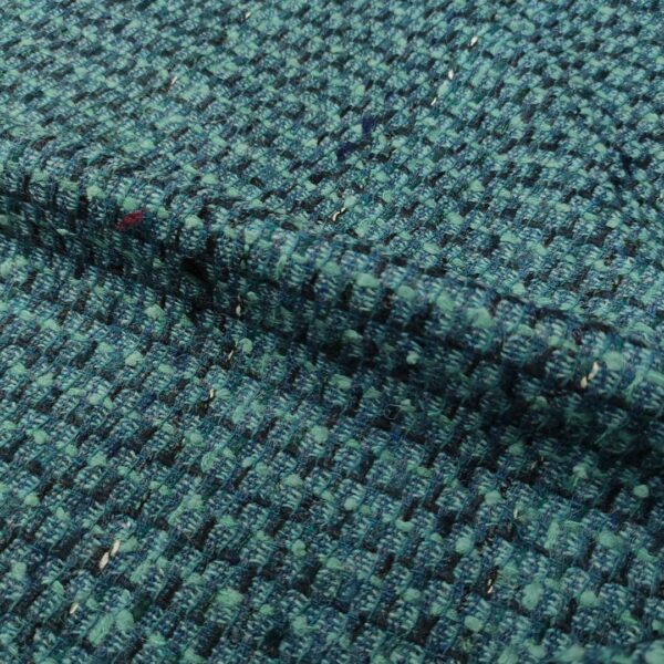 Tessuto Tweed Bouclé in lana verde petrolio - nero - salvia