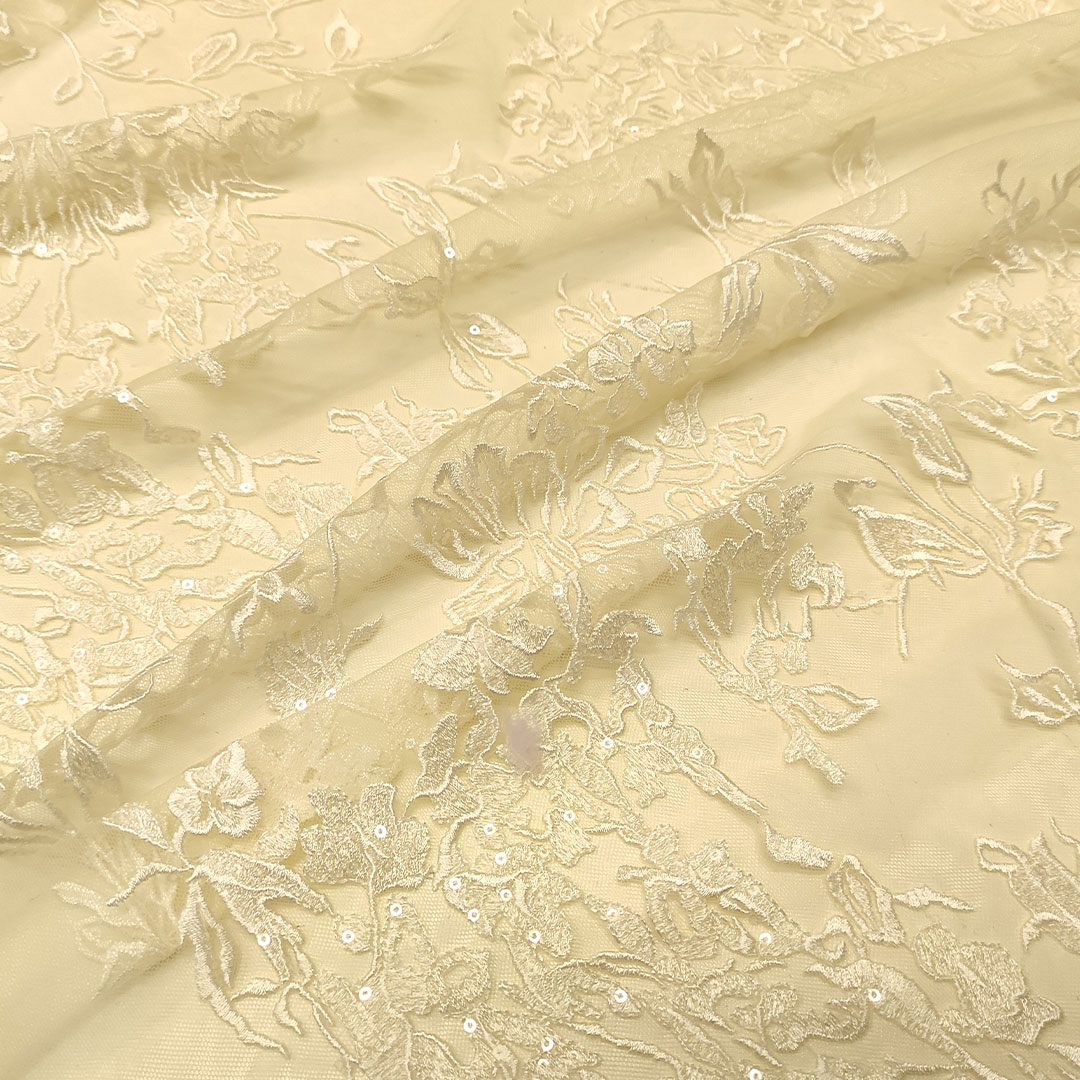 Tessuto pizzo su tulle elasticizzato motivo floreale bianco 01 - Iaia  Tessuti