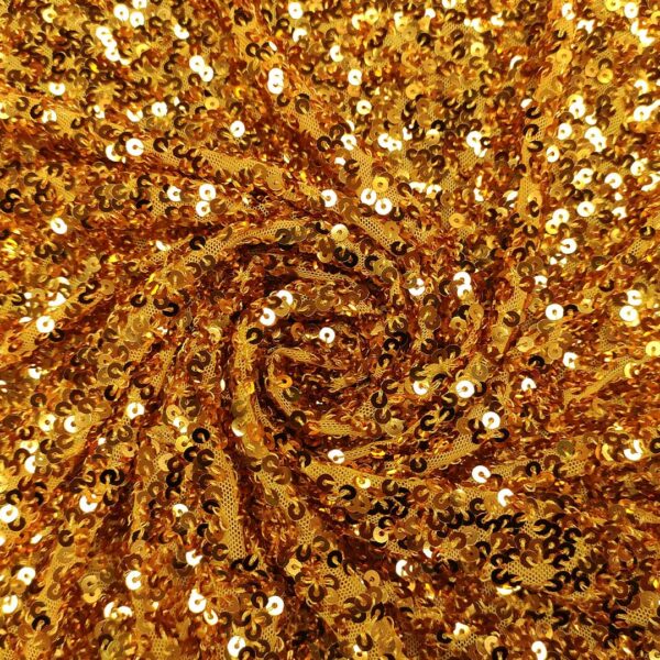 Tessuto tulle elasticizzato ricamato con paillettes ocra