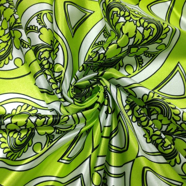 Tessuto Lycra lucida a fantasia motivo astratto lime - bianco