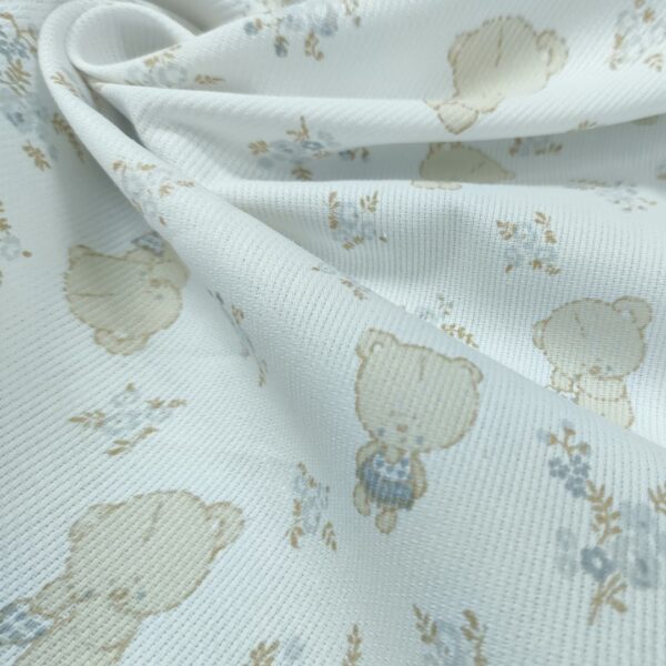 Tessuto Millerighe di Cotone a fantasia motivo orsetti panna - beige - celeste