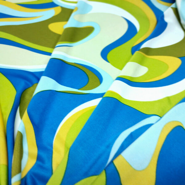 Tessuto Jersey a fantasia motivo astratto verde acido - blu navy - cedro