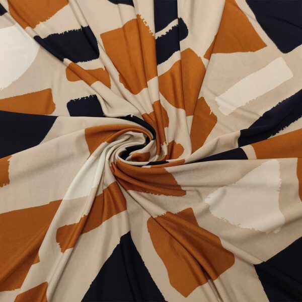Tessuto Jersey a fantasia motivo astratto beige - ruggine - blu