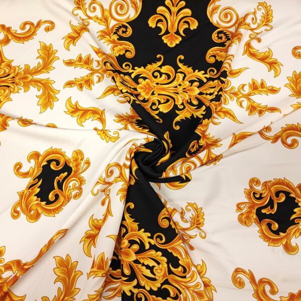 Tessuto Crepe a fantasia motivo floreale barocco nero - bianco - giallo