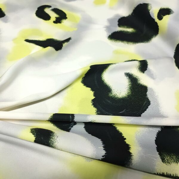 Tessuto Satin a fantasia motivo astratto perla - lime - nero