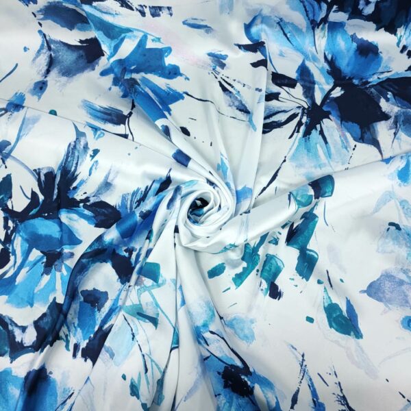 Tessuto Satin elasticizzato a fantasia motivo floreale bianco - turchese - blu