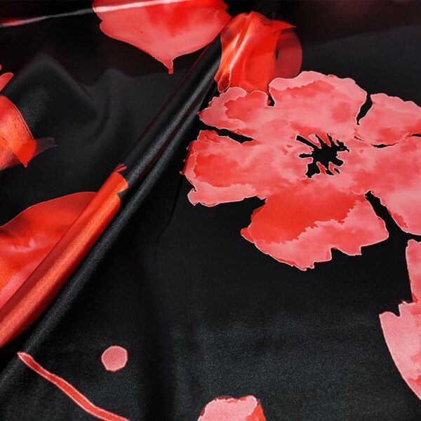 Tessuto Satin elasticizzato a fantasia motivo floreale nero - rosso