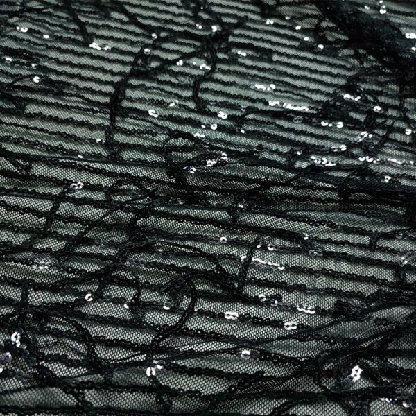 Tessuto Tulle Elasticizzato Ricamato con paillettes motivo frange nero