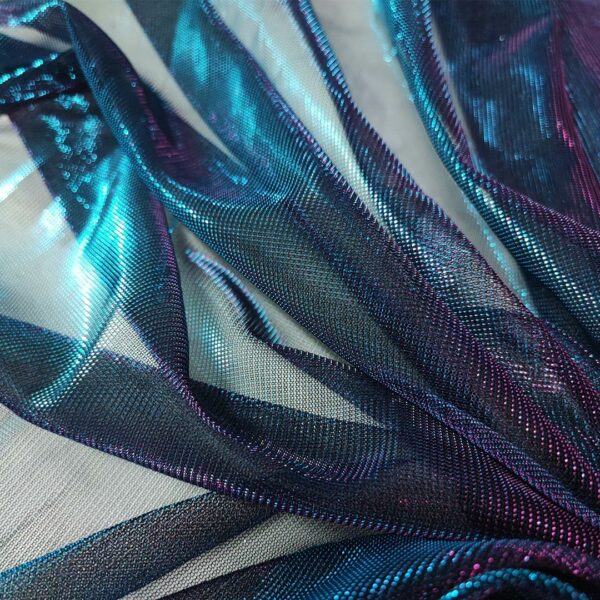 Tessuto Tulle elasticizzato spalmato bicolore turchese - fucsia