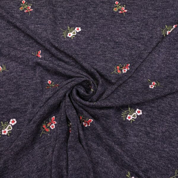 Tessuto Maglia Mano Lana ricamata motivo floreale blu jeans
