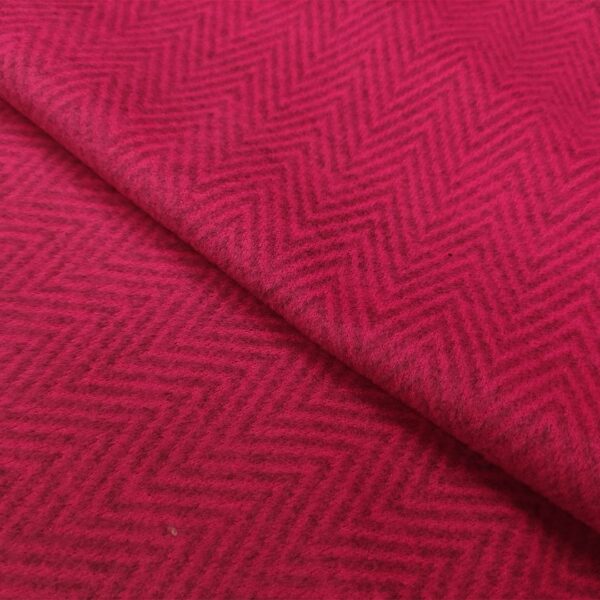 Tessuto per cappotto motivo spigato in tinta unita fucsia