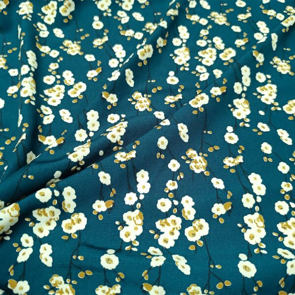 Tessuto Crepe a fantasia motivo floreale verde ottanio - beige