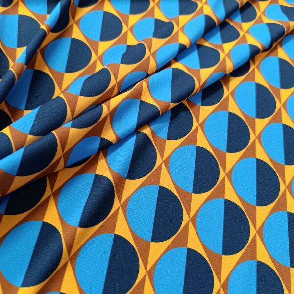 Tessuto Jersey a fantasia motivo geometrico blu - turchese - tabacco