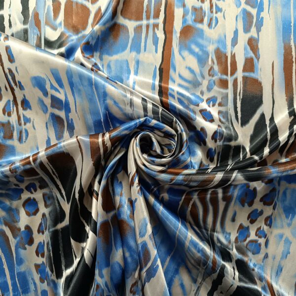 Tessuto Satin a fantasia motivo astratto blu navy - tabacco - beige