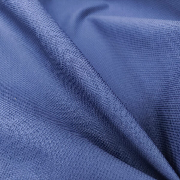 Tessuto piquet di cotone elasticizzato tinta unita blu navy