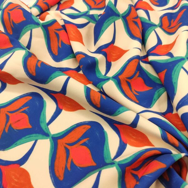 Tessuto Cady elasticizzato a fantasia motivo astratto panna - blu elettrico - arancio