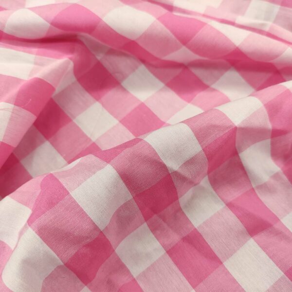Tessuto Cotone leggero a fantasia motivo quadri bianco - rosa