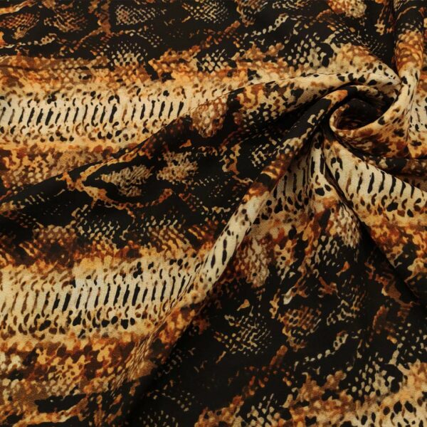 Tessuto Crepe a fantasia motivo animalier beige - marrone - bronzo