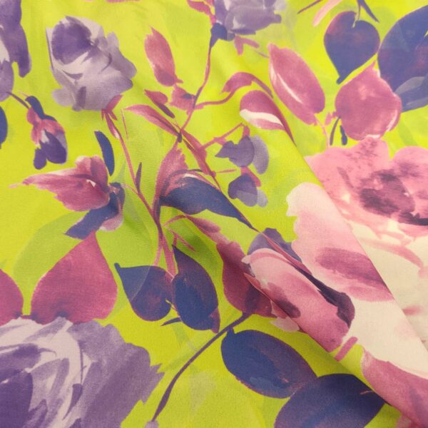 Tessuto Crepe a fantasia motivo floreale verde fluo - viola - rosa