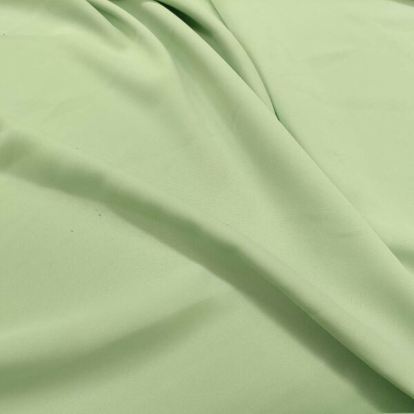 Tessuto Crepe De Chine elasticizzato tinta unita verdino