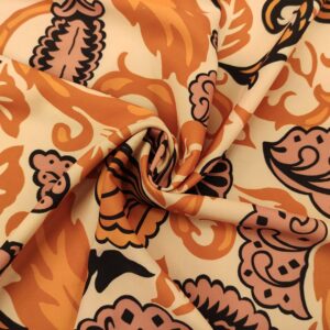 Tessuto Crepe elasticizzato a fantasia motivo astratto ruggine - beige - nero