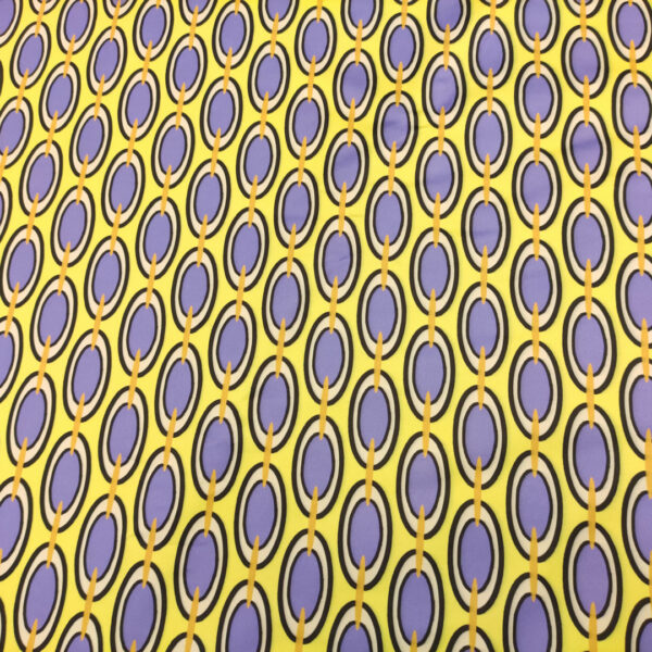 Tessuto Duchesse a fantasia motivo geometrico lilla - lime
