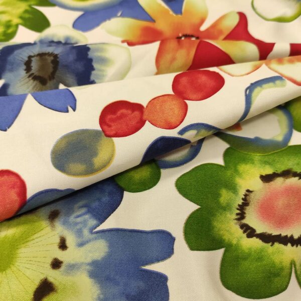 Tessuto Gabardine di Cotone a fantasia motivo floreale bianco - verde - rosso - blu