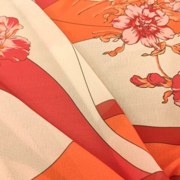 Tessuto Georgette a fantasia motivo floreale panna - arancio - corallo