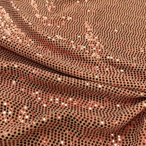 Tessuto Jersey glitter con punti luce rosa gold