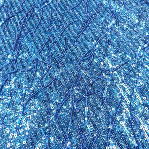 Tessuto lurex Ricamato con paillettes a frange blu elettrico