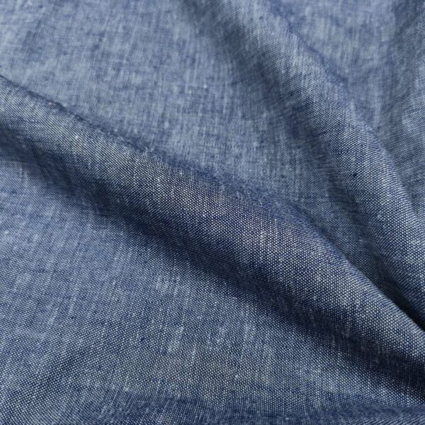 Tessuto Misto Lino in tinta unita effetto melange jeans