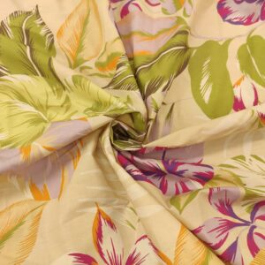 Tessuto Popeline di cotone a fantasia motivo beige - verde acido - lilla