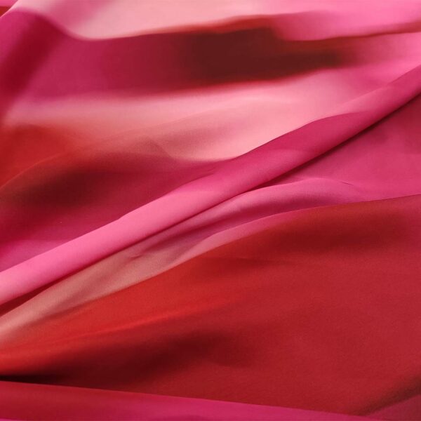 Tessuto Satin a fantasia motivo sfumato fucsia - rosa - arancio