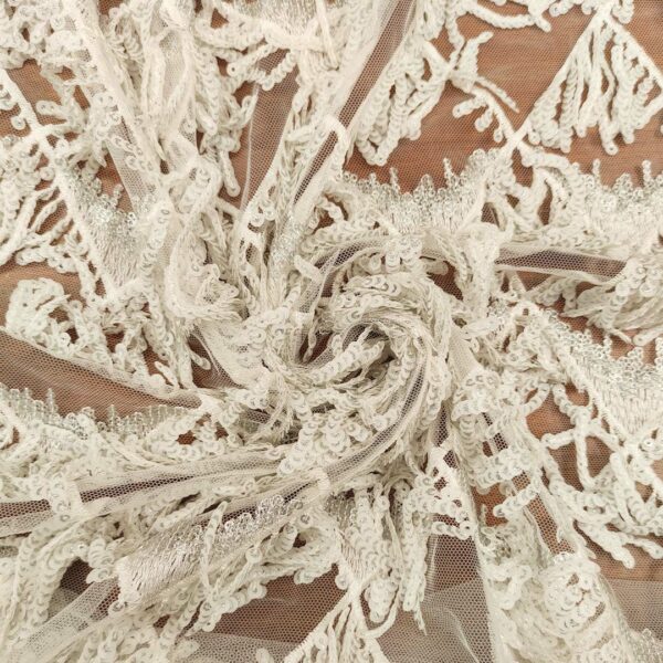 Tessuto Tulle elasticizzato ricamato con paillettes a frange ghiaccio