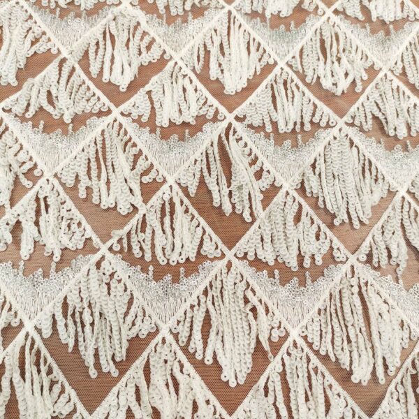 Tessuto Tulle elasticizzato ricamato con paillettes a frange ghiaccio