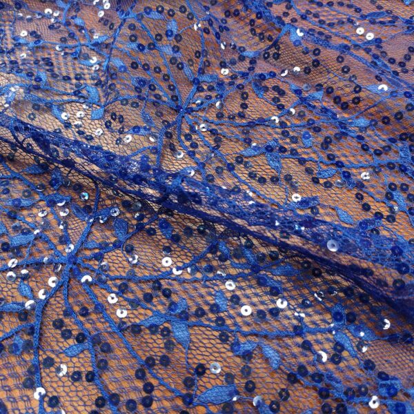 Tessuto Tulle ricamato con paillettes motivo astratto blu elettrico