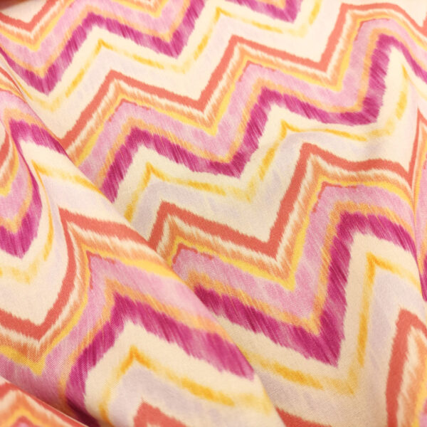 Tessuto Viscosa a fantasia motivo geometrico fucsia - giallo - corallo