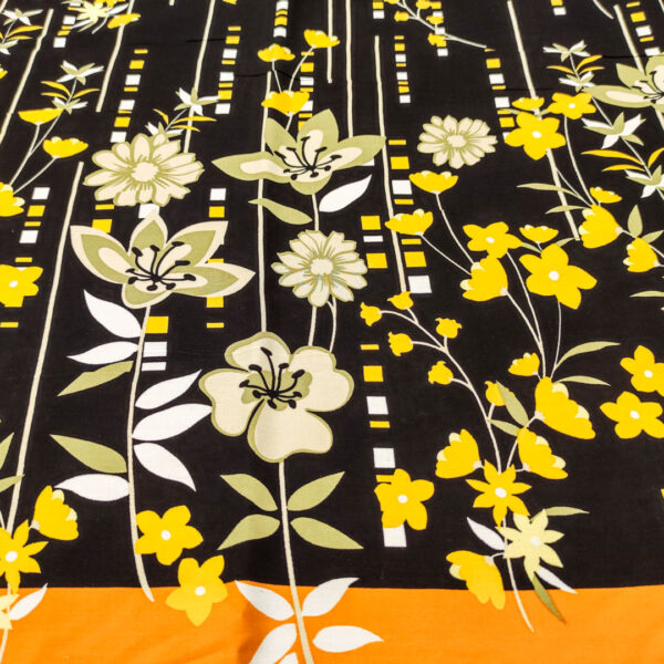 Tessuto Viscosa a fantasia motivo floreale nero - arancio