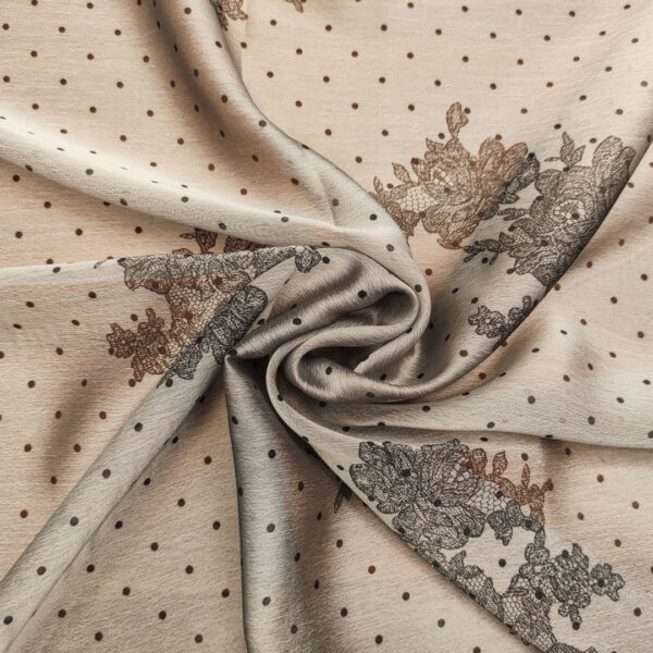 Tessuto Chiffon a fantasia motivo astratto grigio perla - nero