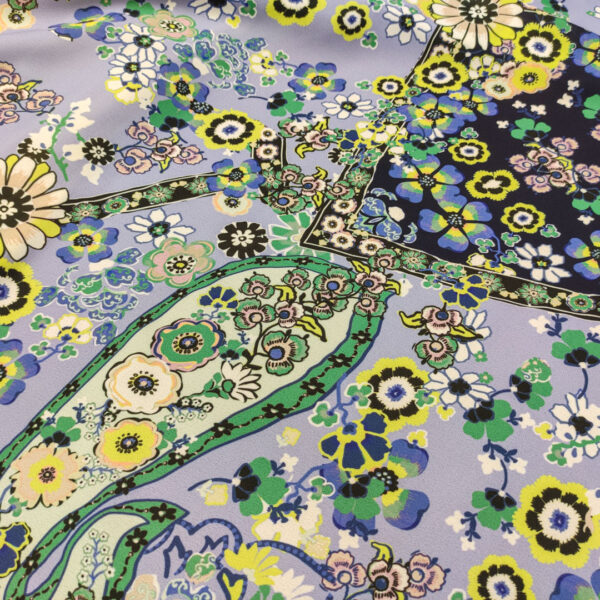 Tessuto Crepe a fantasia motivo floreale cashmere lilla - giallo nero