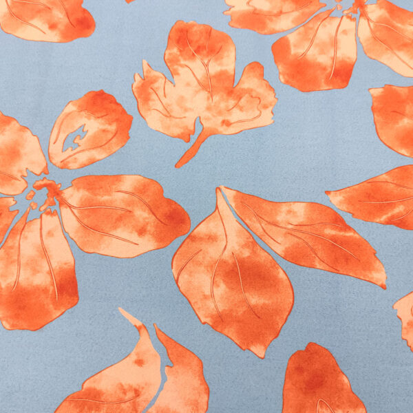 Tessuto Crepe a fantasia motivo floreale azzurro - arancio