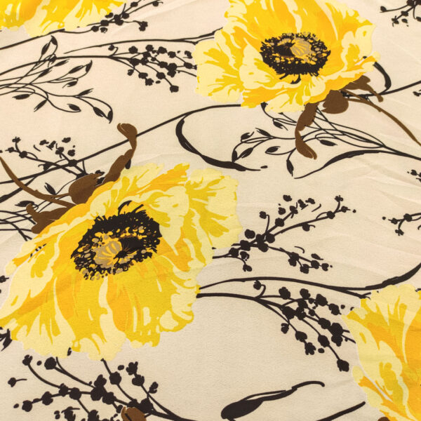 Tessuto Crepe leggero a fantasia motivo floreale panna - nero - giallo