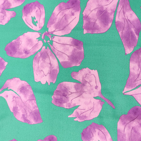 Tessuto Crepe elasticizzato a fantasia motivo floreale smeraldo - orchidea
